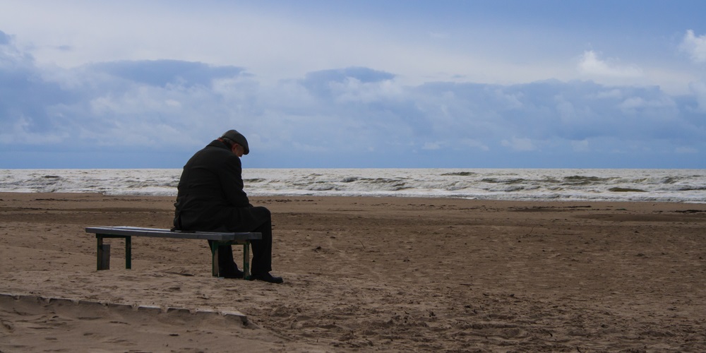 web3-old-man-sit-beach-waves-sad-lonely-shutterstock-konstantin-romanov.jpg