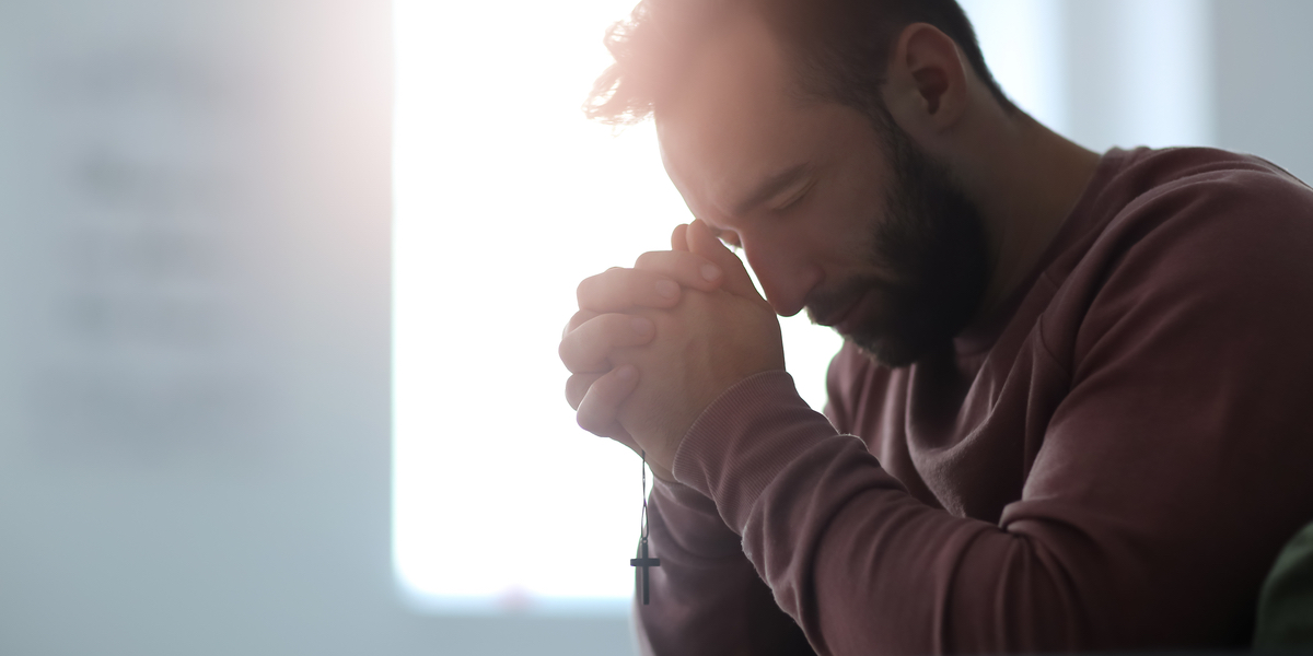 young man praying