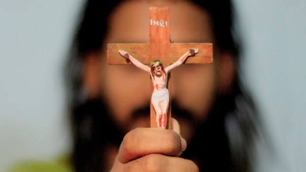 web3-2-man-holding-crucifix-jesus-christ-cross-pexels