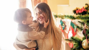 web3-portrait-of-smiling-mother-looking-at-her-little-son-in-living-room-decorated-for-christmas-shutterstock_1173116530.jpg