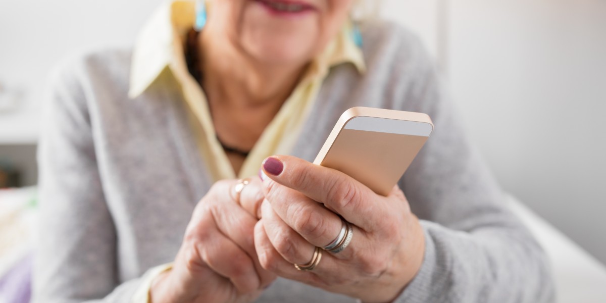 old-person-phone-covid-shutterstock_585622256.jpg