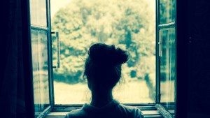 YOUNG WOMAN, WINDOW,