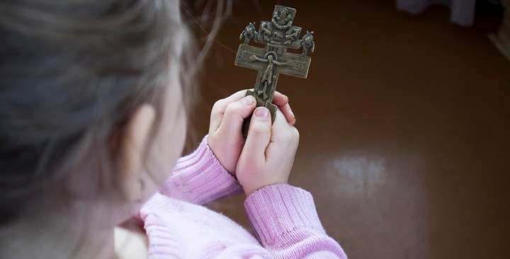 web3-girl-child-faith-cross-jesus-shutterstock.jpg