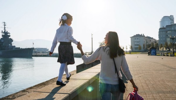 LITTLE GIRL WITH MOTHER,