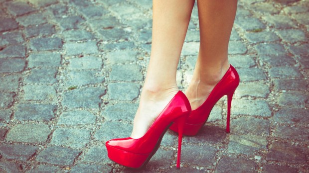 WEB3-woman-legs-in-red-high-heel-shoes-outdoor-shot-on-cobble-street-Shutterstock_145140874.jpg
