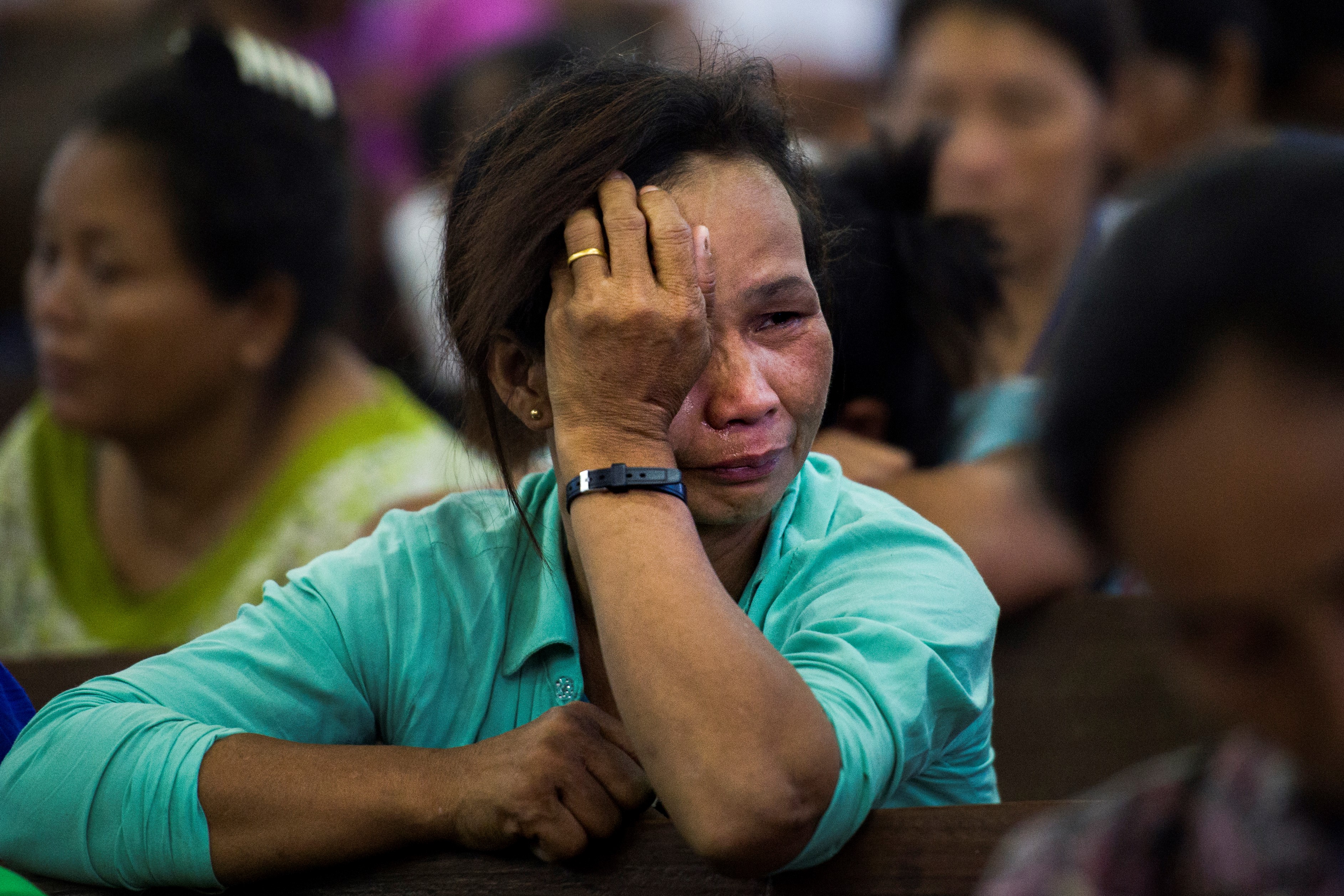 WEB2-PRAY-CRY-WOMAN-MYANMAR-AFP-000_14R2AN.jpg