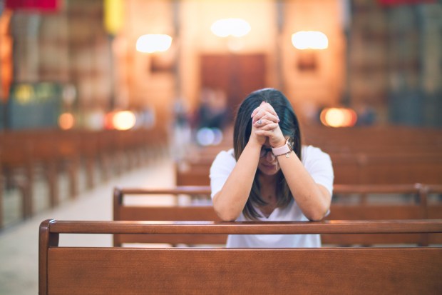 GIRL PRAYS,