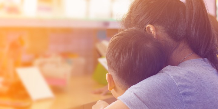 MOM HUGS SON,