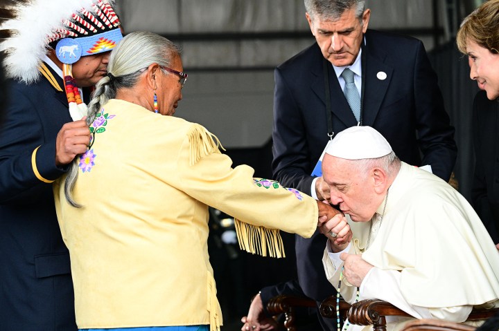 Pope-Francis-meets-members-of-an-indigenous-tribe-during-his-welcoming-ceremony-at-Edmonton-International-Airport-AFP