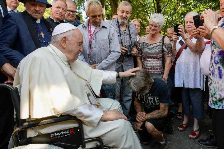Pope Francis meets with guests of the Fraternité Saint-Alphonse in Quebec - AFP