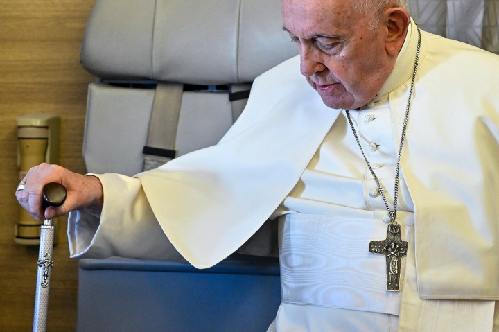 Pope-Francis-arrives-to-address-journalists-aboard-the-plane-flying-from-Nur-Sultan-to-Rome-AFP
