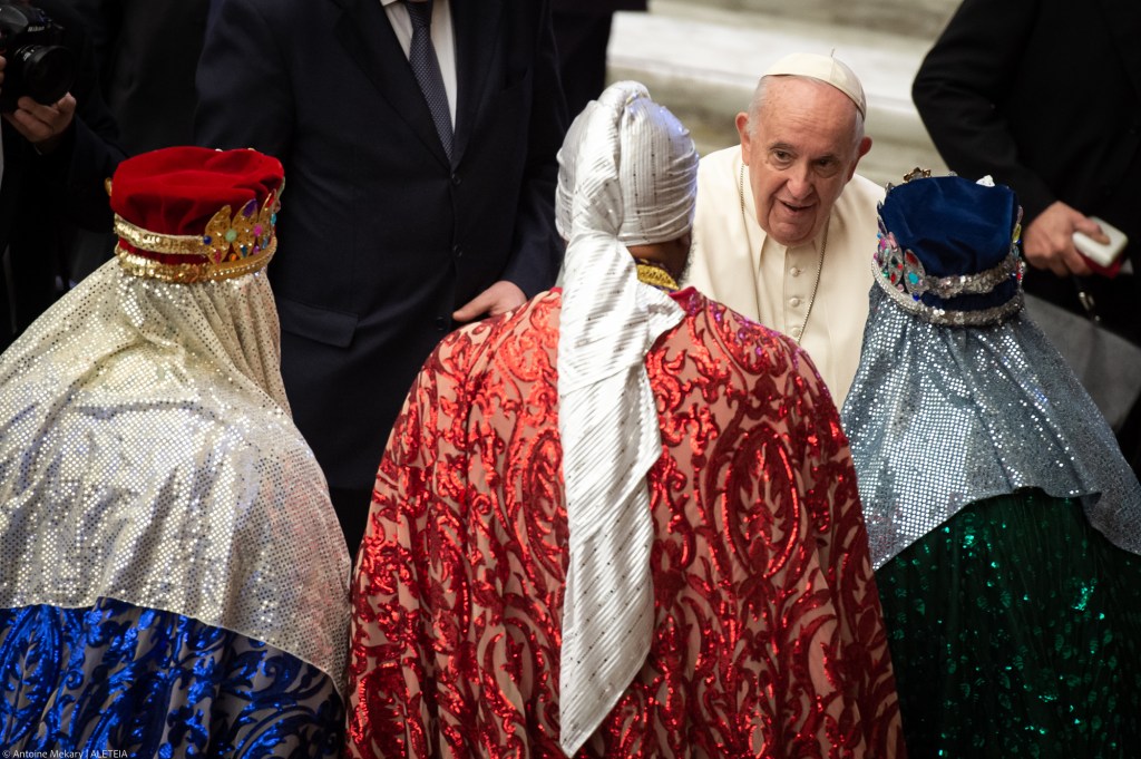 Pope Francis greets faithful dressed as the Three Wise Men during his weekly general audience in Paul VI hall