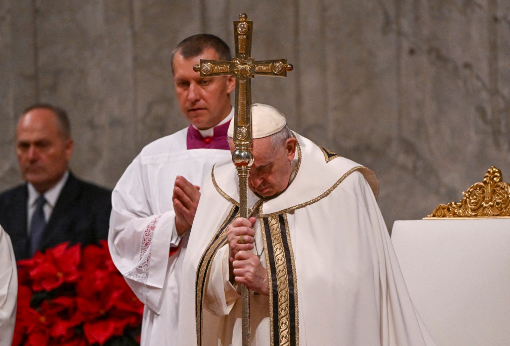 Pope Francis attends the Christmas Eve mass-AFP