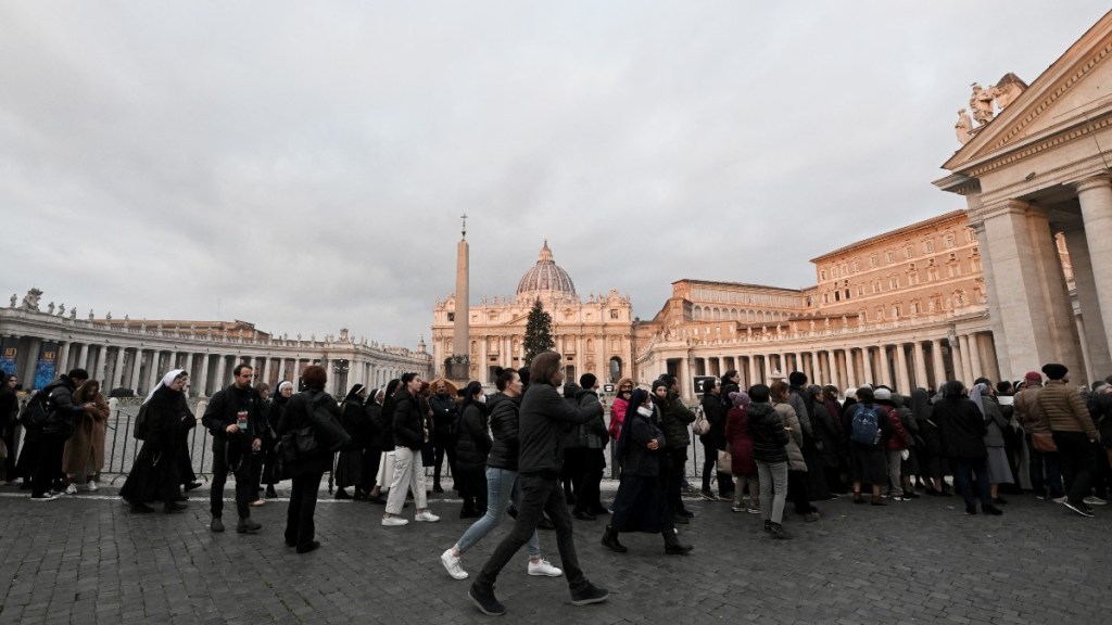 Crowds flock to the Vatican to pay their respects to the remains of Pope Benedict XVI