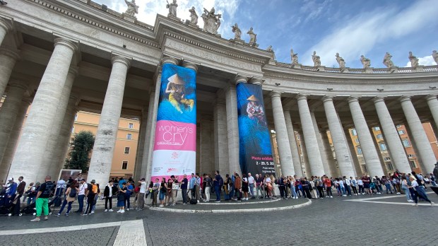 The entrance of the photo exhibit "Women's Cry" on St. Peter's Square
