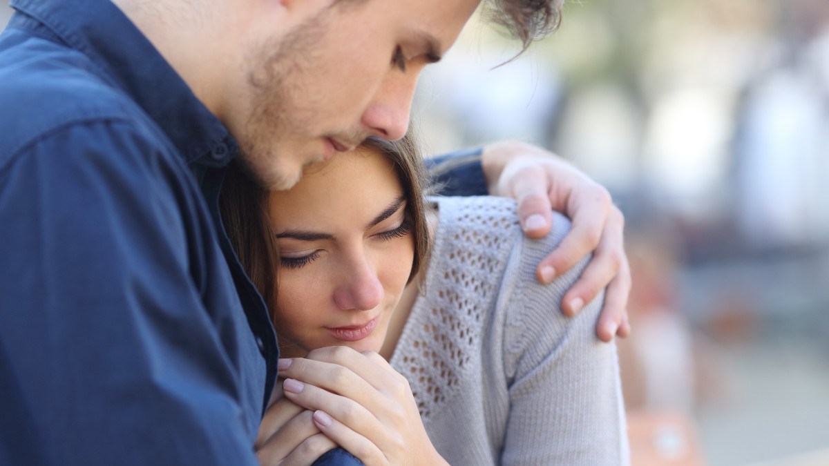 COUPLE-PARDON-HUG-SORROW.jpg