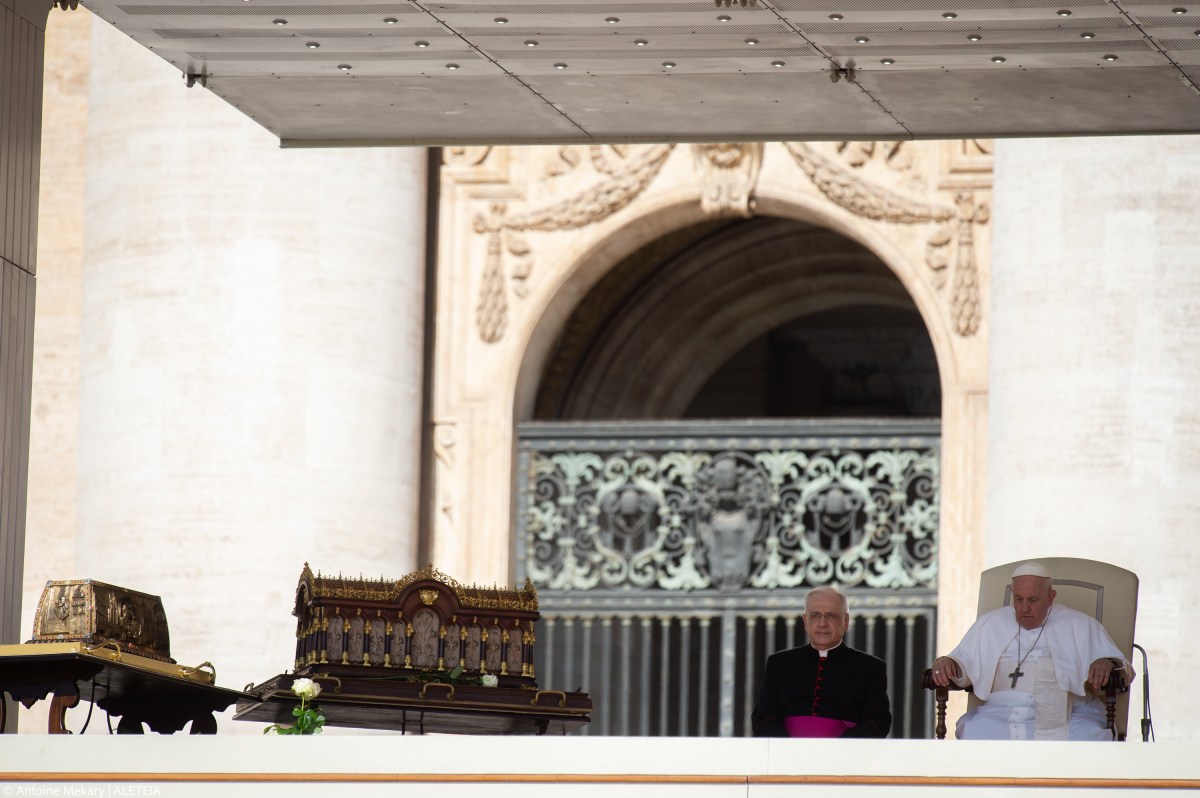 Pope Francis stands by the relics of Saint Therese of Lisieux