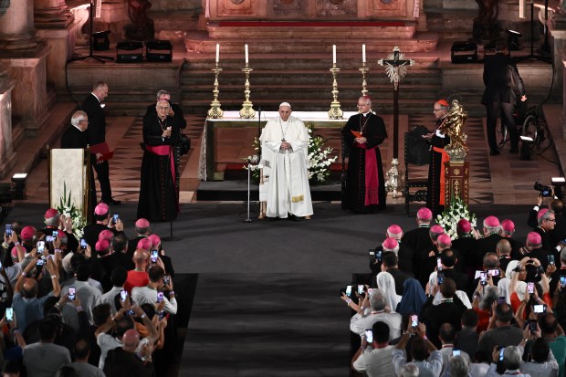 Pope Francis celebrates vespers at the Jeronimos Monastery in Lisbon, during his five-day visit to attend the World Youth Day
