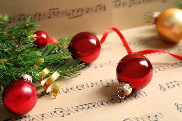 Christmas decorations on sheet music