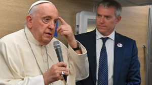 Pope Francis addresses journalists aboard the Papal plane heading to Mongolia on August 31, 2023