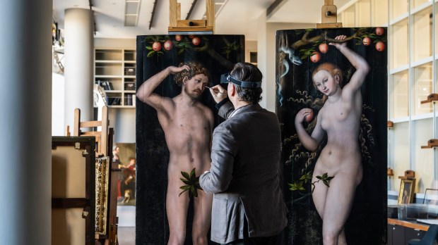Ulrich Birkmaier conserving the Norton Simon Museum’s Adam and Eve by Lucas Cranach the Elder in Getty Museum’s conservation studio.