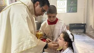 gaza, première communion; eucharistie, guerre