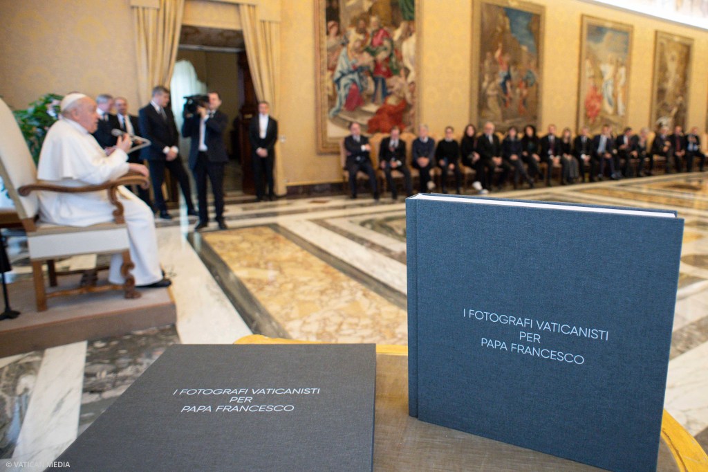 Pope Francis in a private audience with Vatican photographers