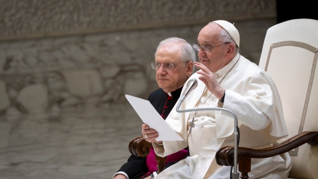 Pope Francis blesses faithful at the end of his weekly general audience in Paul VI Hall