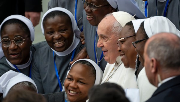 Pope Francis blesses faithful at the end of his weekly general audience in Paul VI Hall