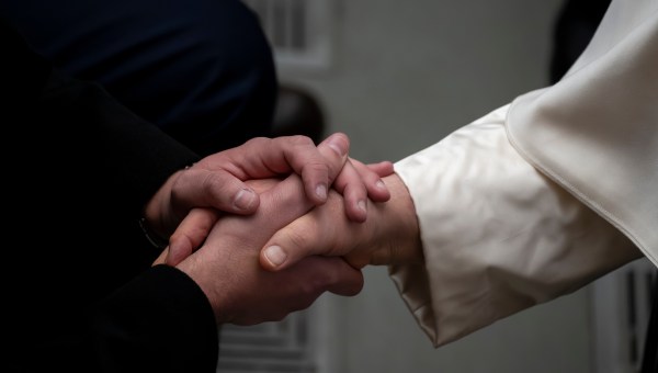 Pope Francis blesses the faithful at the end of his weekly general audience in Paul VI Hall