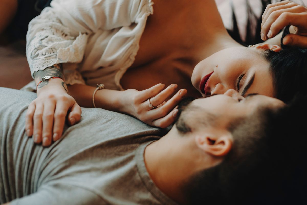 Couple hugging in bedroom