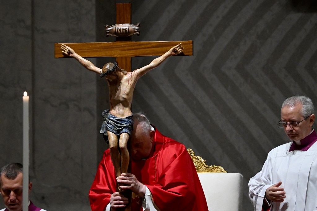 Pope Francis presides the Passion of the Lord mass on Good Friday as part of the Holy Week celebrations, at St Peter's Basilica in the Vatican on March 29, 2024