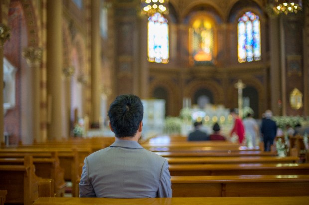 man-church-pray-