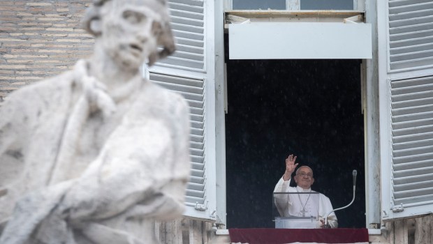 Pope Francis addresses the crowd from the window of the apostolic palace overlooking St. Peter's square during the Regina Coeli prayer on May 19, 2024 in The Vatican.