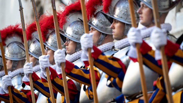 Swiss Guards take part in a swearing-in ceremony in San Damaso Courtyard, Vatican on May 06, 2024