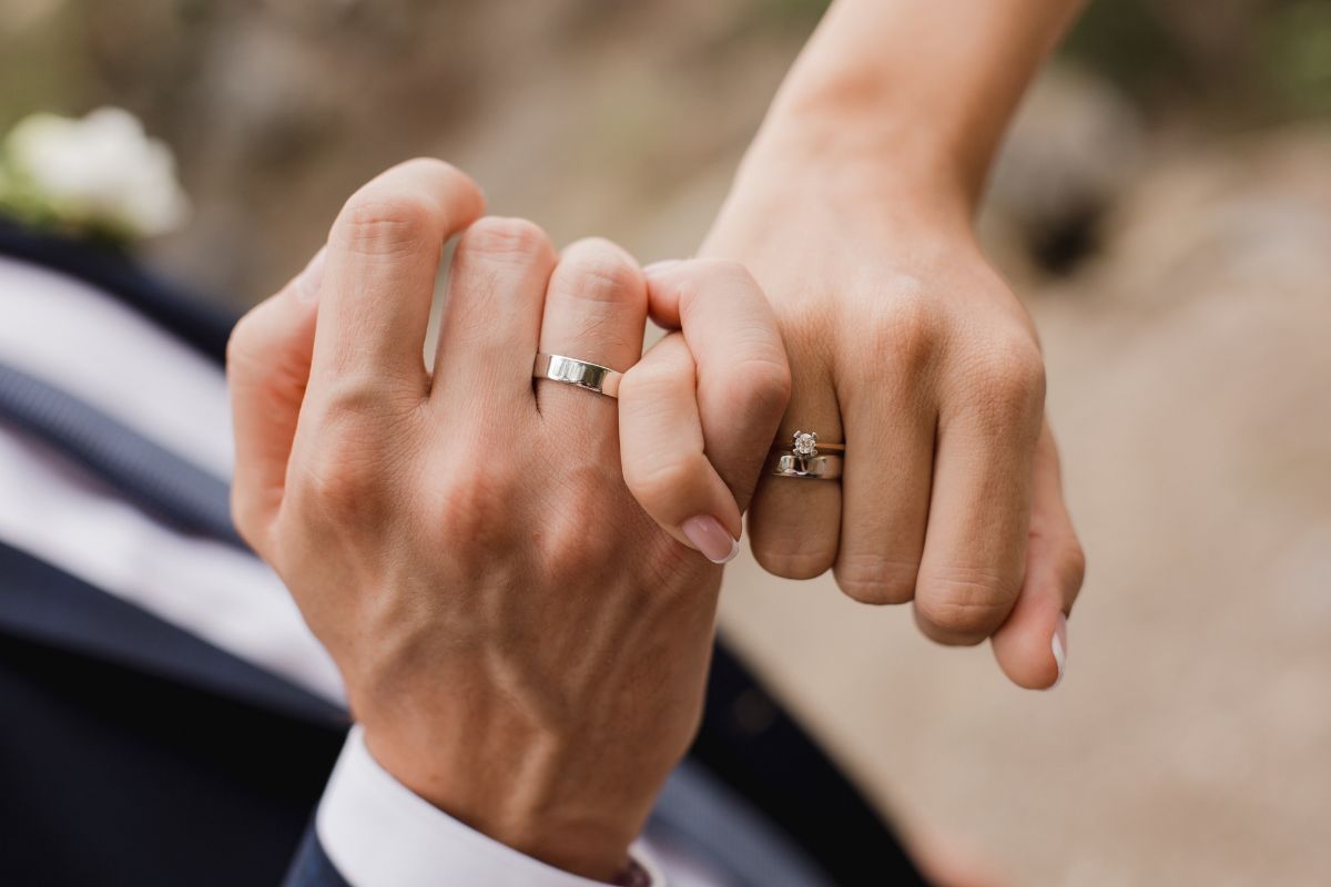 man and woman with wedding ring