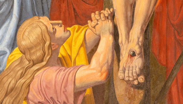 The detail of fresco of Crucifixion (Mary of Magdalen) in the church of St. John the Nepomuk by Josef Furlich