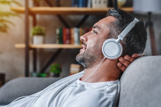 man-headphones-podcast-