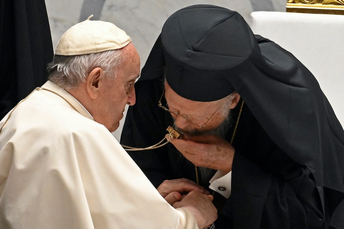 Ecumenical Patriarch Bartholomew I reverences pectoral cross of Pope Francis