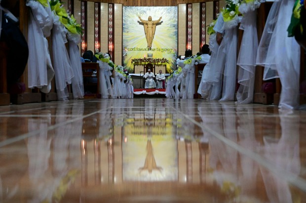 Pope Francis (background C) attends a meeting with bishops and members of the clergy from Papua New Guinea and the Solomon Islands at the Shrine of Mary Help of Christians in Port Moresby on September 7, 2024.