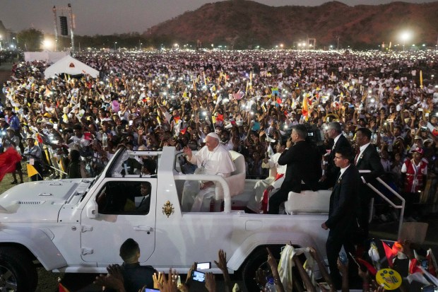 Pope Francis gestures as he leaves after leading holy mass at the Esplanade of Tasitolu in Dili, East Timor, on September 10, 2024