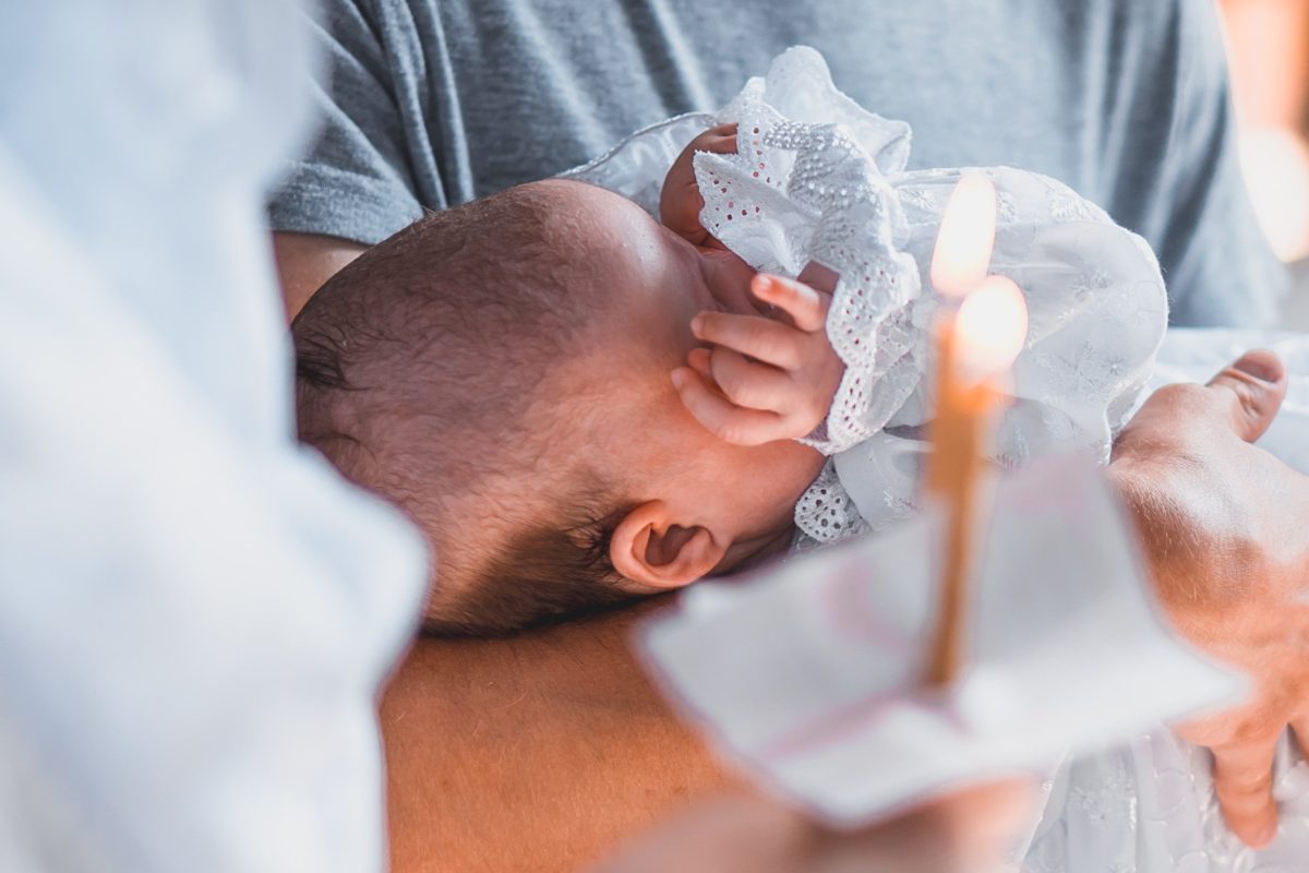 Baby during baptism closeup