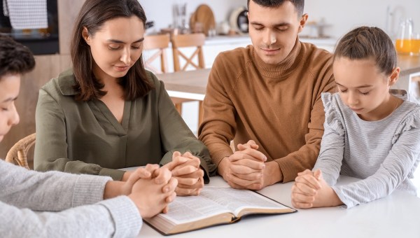 family praying