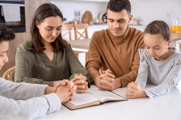 family praying