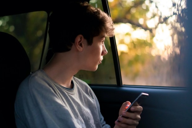 - teenager-car-phone-