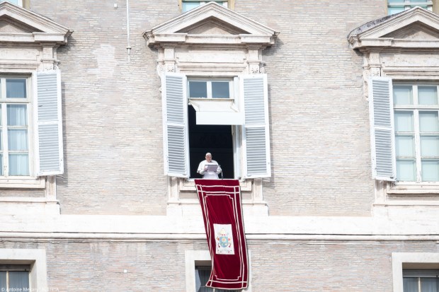 Pope Francis delivers his blessing during the Angelus prayer in St.Peter's Square at the Vatican on January 6, 2025