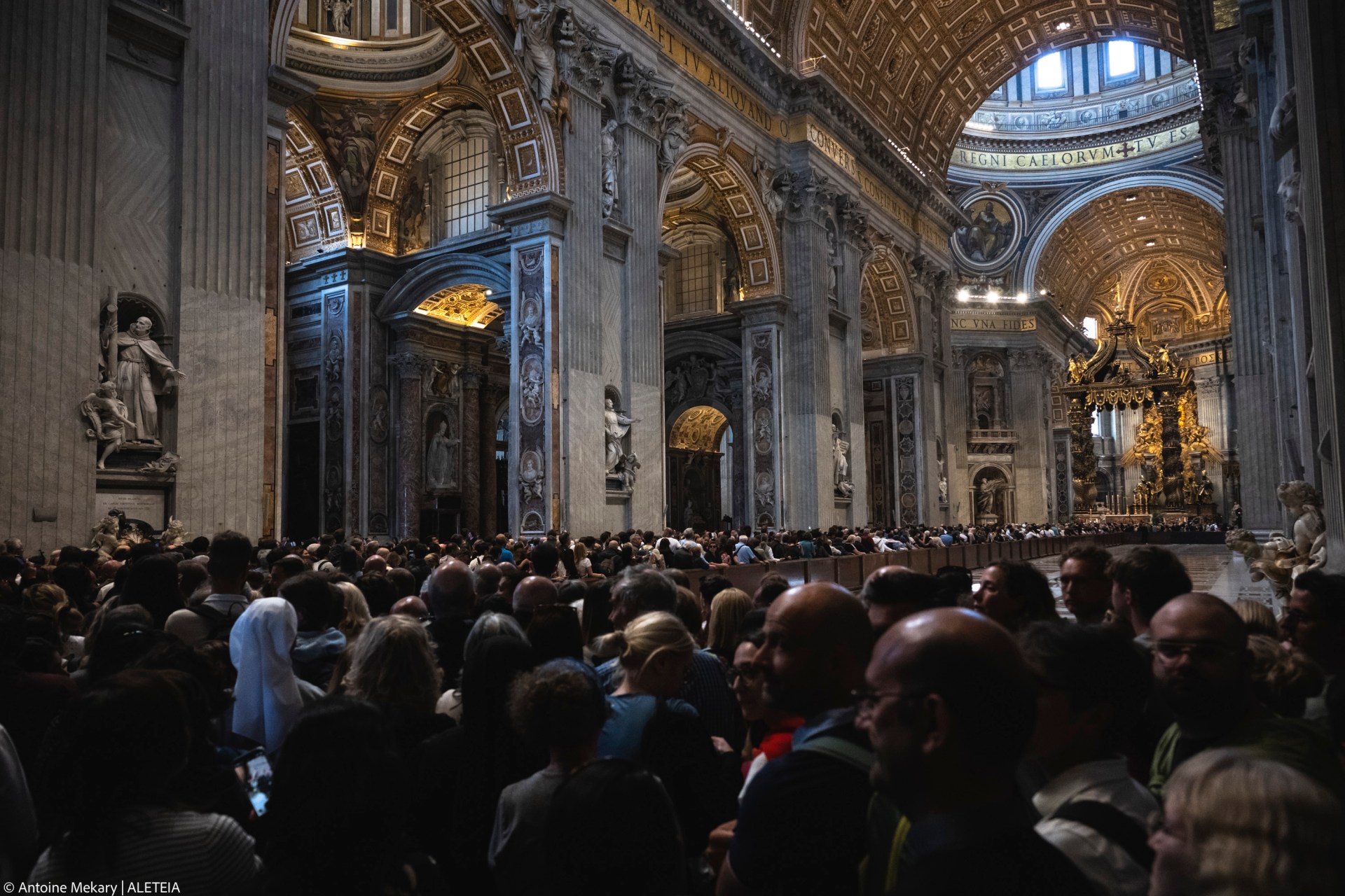 People stay in a line to pay respect to coffin with body of Pope Francis displayed at Saint Peter's Basilica in Vatican on April 23, 2025