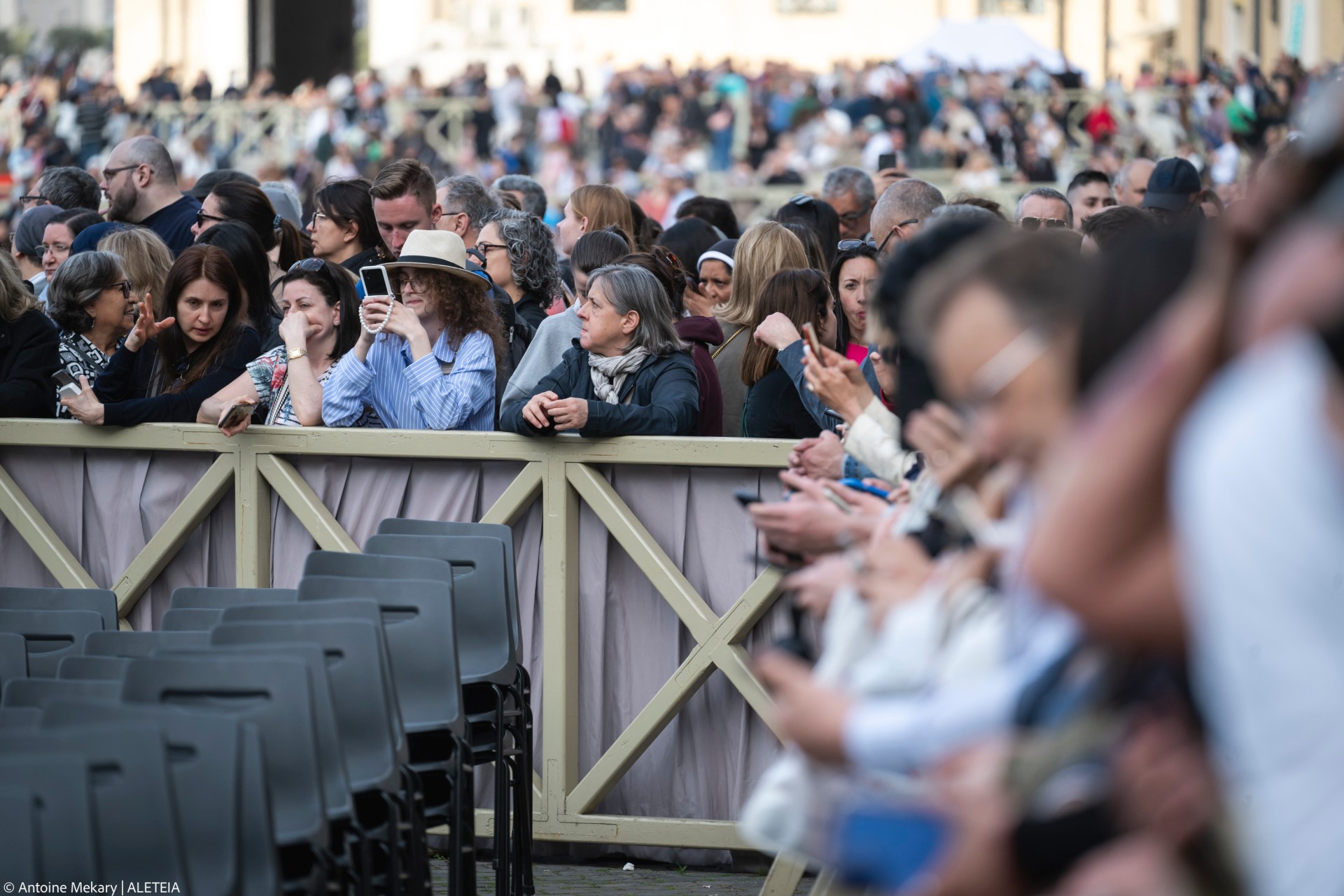 Devotees attend a Rosary in homage to Pope Francis following his death in Saint Peter's Square, the Vatican, on April 21, 2025