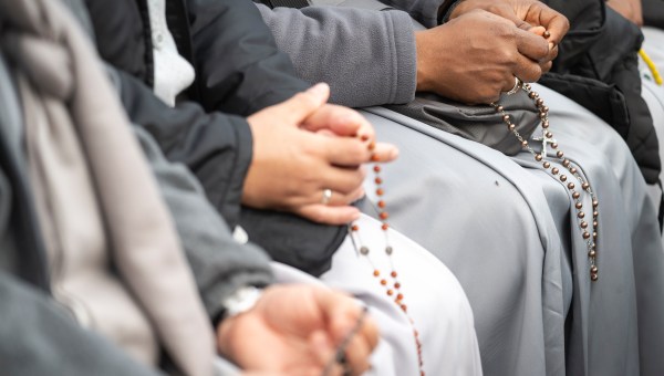Devotees attend a Rosary in homage to Pope Francis following his death in Saint Peter's Square, the Vatican, on April 21, 2025