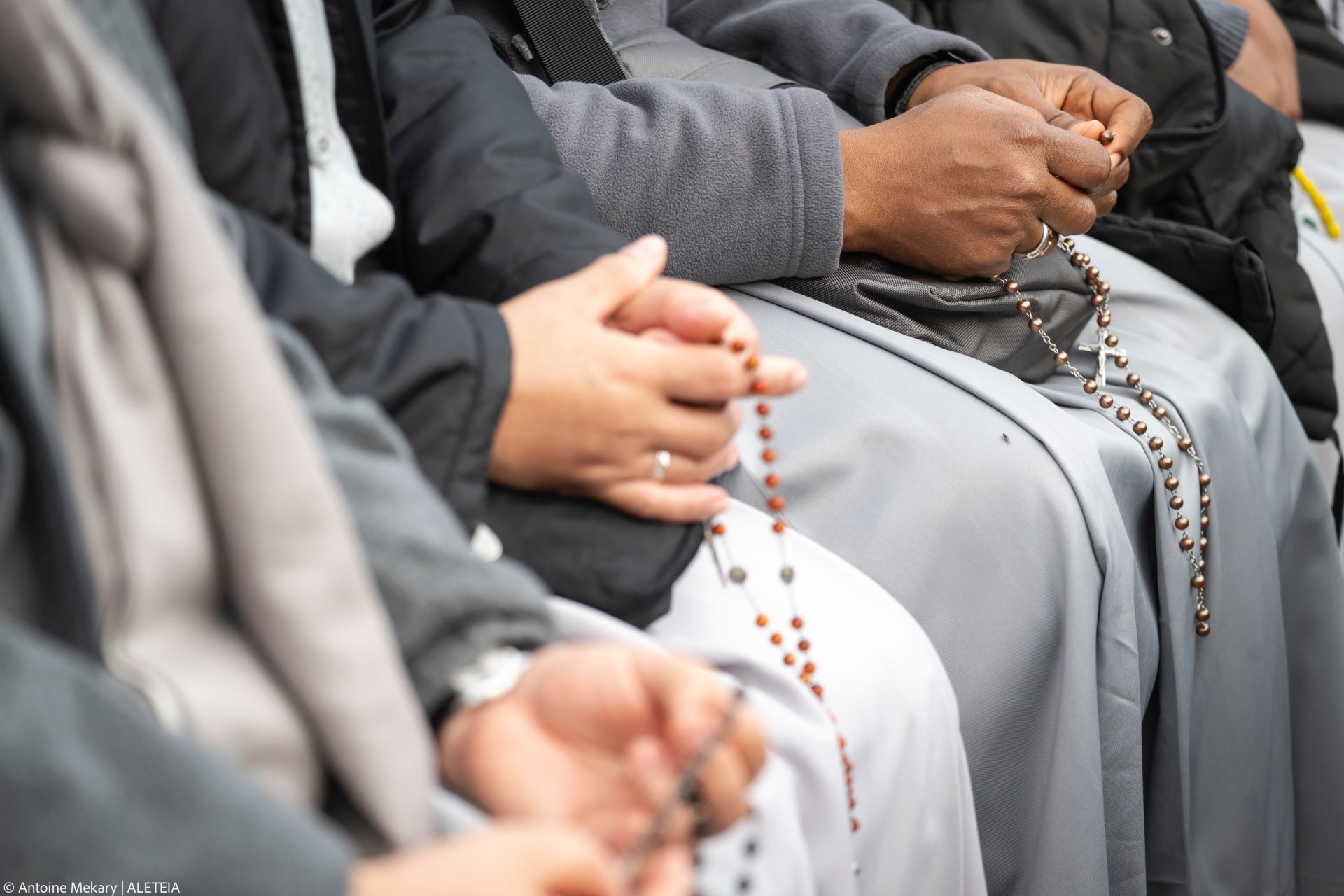 Devotees attend a Rosary in homage to Pope Francis following his death in Saint Peter's Square, the Vatican, on April 21, 2025